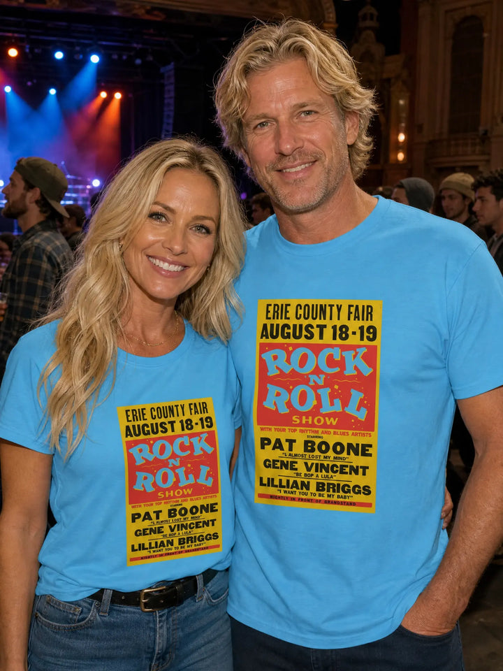 Two people wearing blue t-shirts with a concert poster design.