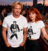 Two people wearing t-shirts with guitarists' images at a rooftop bar with a cityscape background.