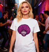 Woman wearing a white t-shirt with a graphic design in a street setting